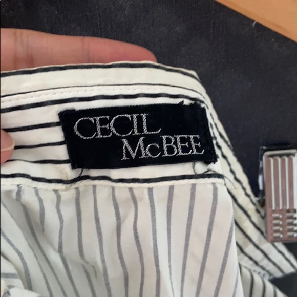 Sleeveless buttoned shirt - Picture 3 of 6